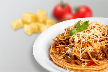 spaghetti pasta with meatballs and sauce, basil, cheese