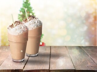 Christmas cocktail or egg nog with whipped cream