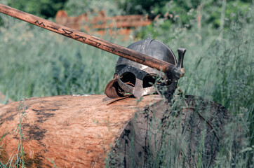 Ancient Viking armor. Helmet and ax. Close-up. Historical photo concept.