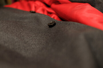 Fabric ready-made suit textile shades in the workplace, tailor or tailor, close view, atelier