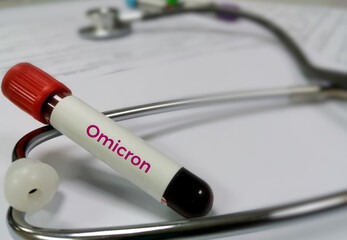 Blood sample tube for Omicron or B.1.1.529 variant of COVID-19 coronavirus test. Omicron Variant test, blood sample with a New Variant of the Coronavirus test