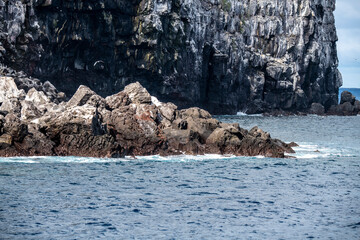 black volcanic rocks on the uninhabited Galapagos Islands 