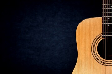 Guitar on background. Classic acoustic guitar concept. Perfect for flyer, card, poster or wallpaper