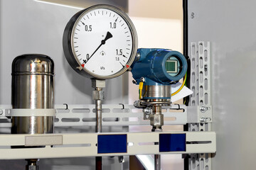 Hydraulic pressure gauge, manometer - instrument for measuring the pressure of fluid on a hydraulic...