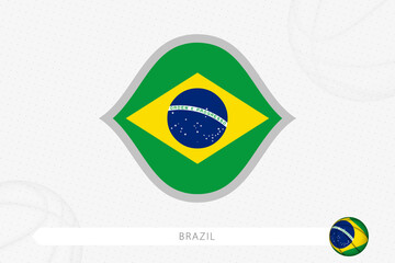 Brazil flag for basketball competition on gray basketball background.