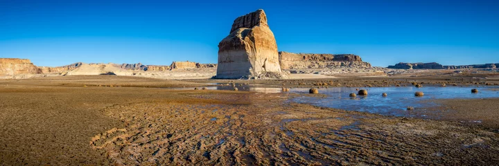 Fotobehang Drought at Lone Rock Beach with Low Water Levels, Page Arizona, America, USA. © jon manjeot