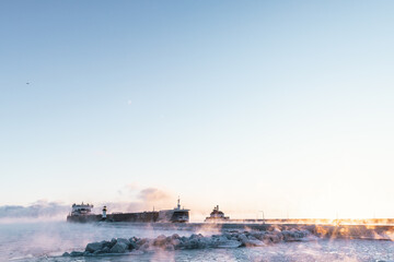Fototapeta premium Ship in Duluth Minnesota Cold - Temp Sea Smoke MN 