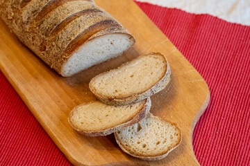 Sliced white bread on a cutting board