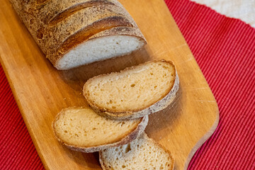 Sliced white bread on a cutting board