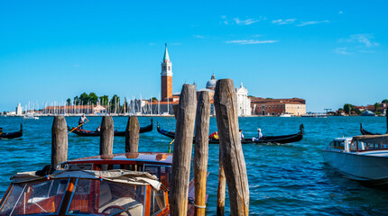 Gondolas moored. Grand canal on the background Venice, Italy. Architecture and landmarks of Venice. Retro vintage style filter effect.