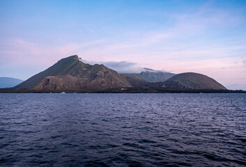 uninhabited islands of the Galapagos archipelago against the backdrop of the sea and blue sky 