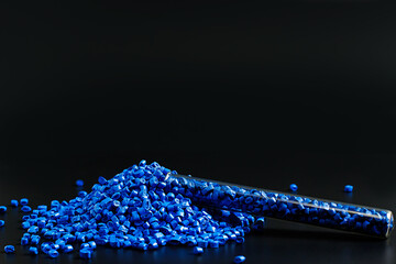 Blue granules of polypropylene, polyamide. Background. Plastic and polymer industry. Microplastic...