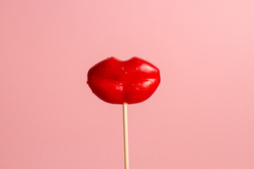 Valentine concept. Red Lip-shaped Lollipop