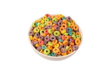 Colorful rings cereal spill out into a bowl. Breakfast. Isolated.