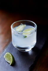 Gin and Tonic on dark background. Close up.	