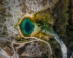 The spring of the Cetina River (izvor Cetine) in the foothills of the Dinara Mountain is named Blue Eye (Modro oko). Cristal clear waters emerge on the surface from a more than 100 meter-deep cave.