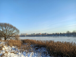 winter cityscape with river
