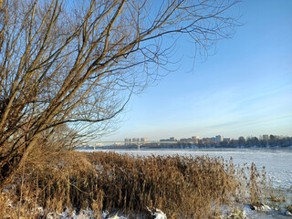 winter cityscape with river