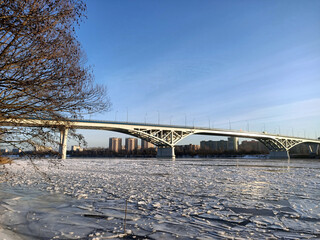 winter cityscape with river