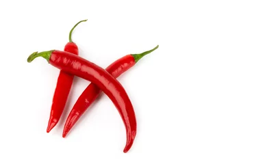Fotobehang Three red chili peppers isolated on white background. Copy space.  © sergeyyrev