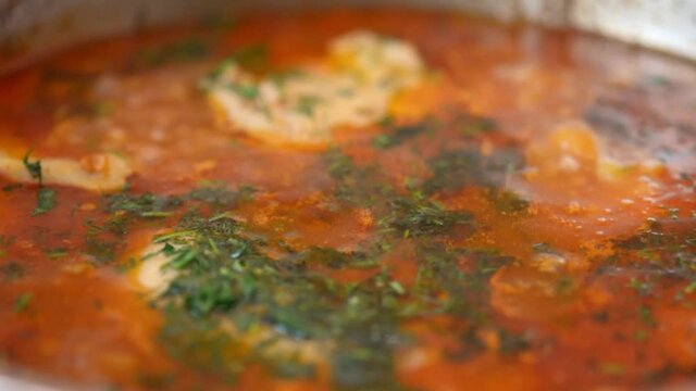 Freshly cooked Red borscht boils, Ukrainian dishes, close-up, selective focus, shallow depth of field