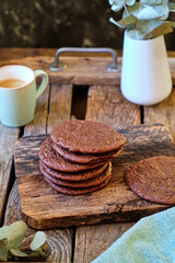 Obraz na płótnie Canvas chocolate chip cookies on a wooden background.