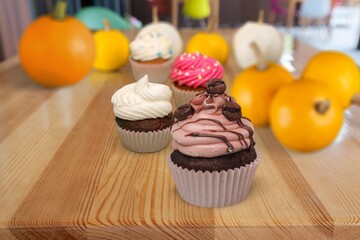 Muffins with pumpkin. Delicious homemade dessert. Halloween treats. Vegetarian dish.