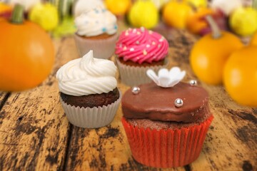 Muffins with pumpkin. Delicious homemade dessert. Halloween treats. Vegetarian dish.