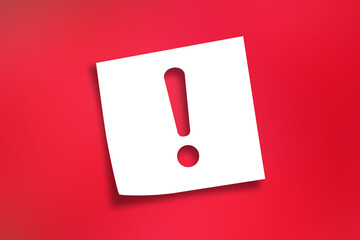 Note paper with exclamation mark on red background	