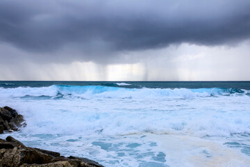 Stormy sea with foamy waves 