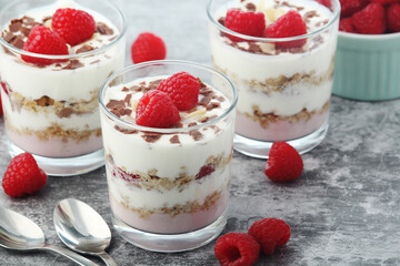 Granola with yogurt trifles with raspberry