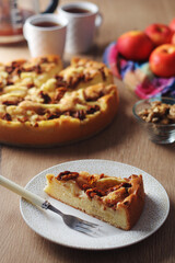 Apple pie with walnuts - typical autumn dish