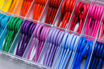 A set of colored elastic bands for installing braces in orthodontic dental treatment