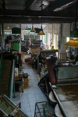 Naklejka na ściany i meble Ceylon. Sri Lanka. Nuwara Eliya. Damro Tea Factory. Interior inside the workshop among the machines.