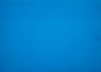 Photo of a blue background texture, a clean place for text. Sea-colored background.