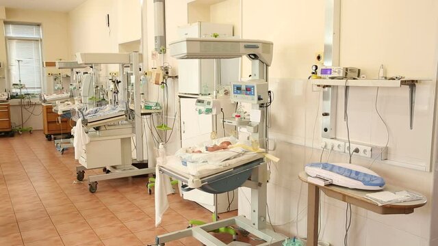 Labour ward with incubators for babies. New born premature baby in incubator. Newborn in child hood,labour room in hospital