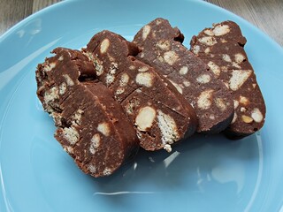 Chocolate biscuit salami - cookies on a plate