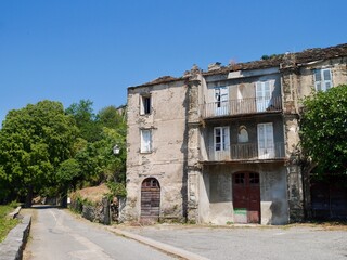 Fototapeta premium Traditional stone houses in Moita, a dreamy hilltop village nestled in the mountains of Castagniccia, Corsica, France.