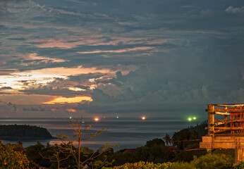 Fototapeta premium Tropical view at sunset over Andaman Sea at Phuket, Thailand.