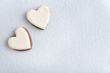 White heart shape cookies for Mothers day, Womans day or Valentines Day. Copy space