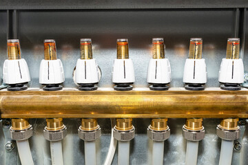 New brass manifold for underfloor heating systems with rotameters  indicate flow of 0 liters per...