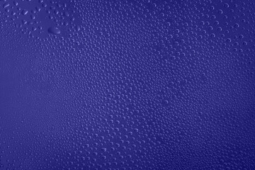 Background of Very Peri water drops on glass