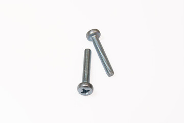 Metal screws on an isolated white background.