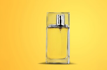 A Bottle of Perfume. Beautiful Gold Glass Bottle Spray. Modern Luxury Parfum