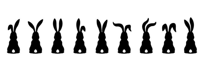 Nine different silhouettes of Easter bunnies isolated on a white background.