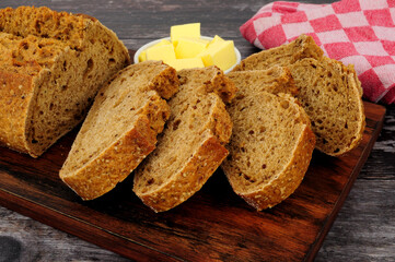 Stone baked sourdough crusty bread bloomer loaf with red rye multi grains
