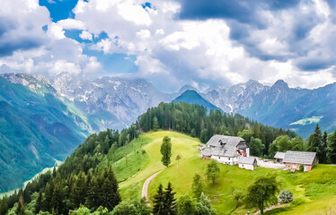 Fototapeta na wymiar Mountain landscape, Alps in Slovenia with farm next to Logarska dolina