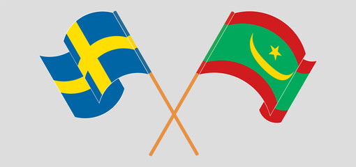 Crossed and waving flags of Sweden and Mauritania