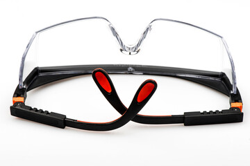 Protective safety glasses isolated on white background