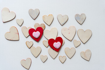 grungy wooden hearts with fancy pink paper hearts